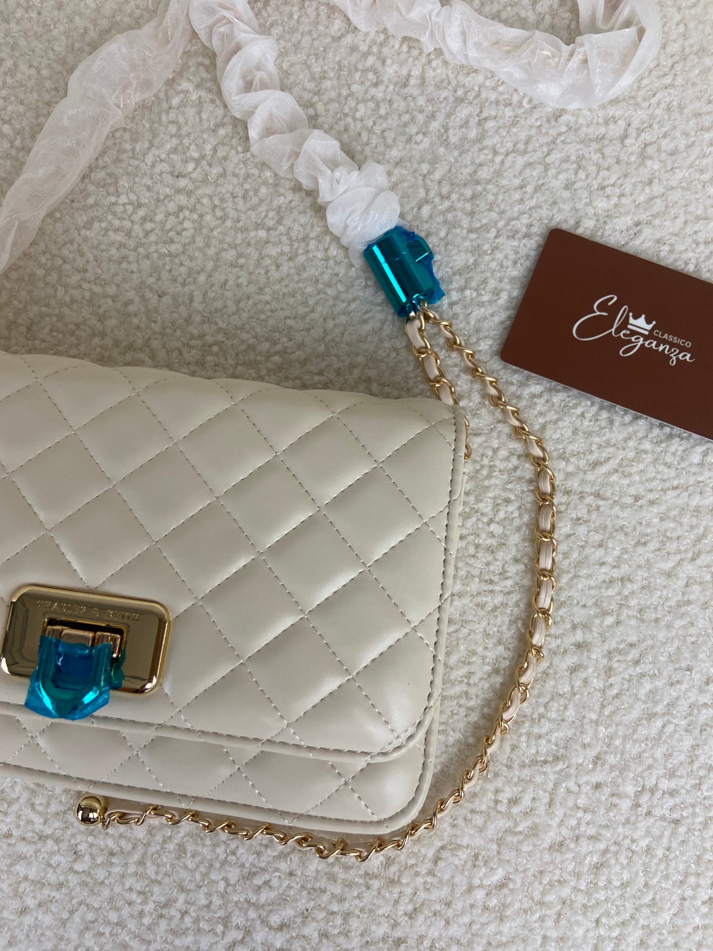 C&K Quilted Flip-Lock Clutch