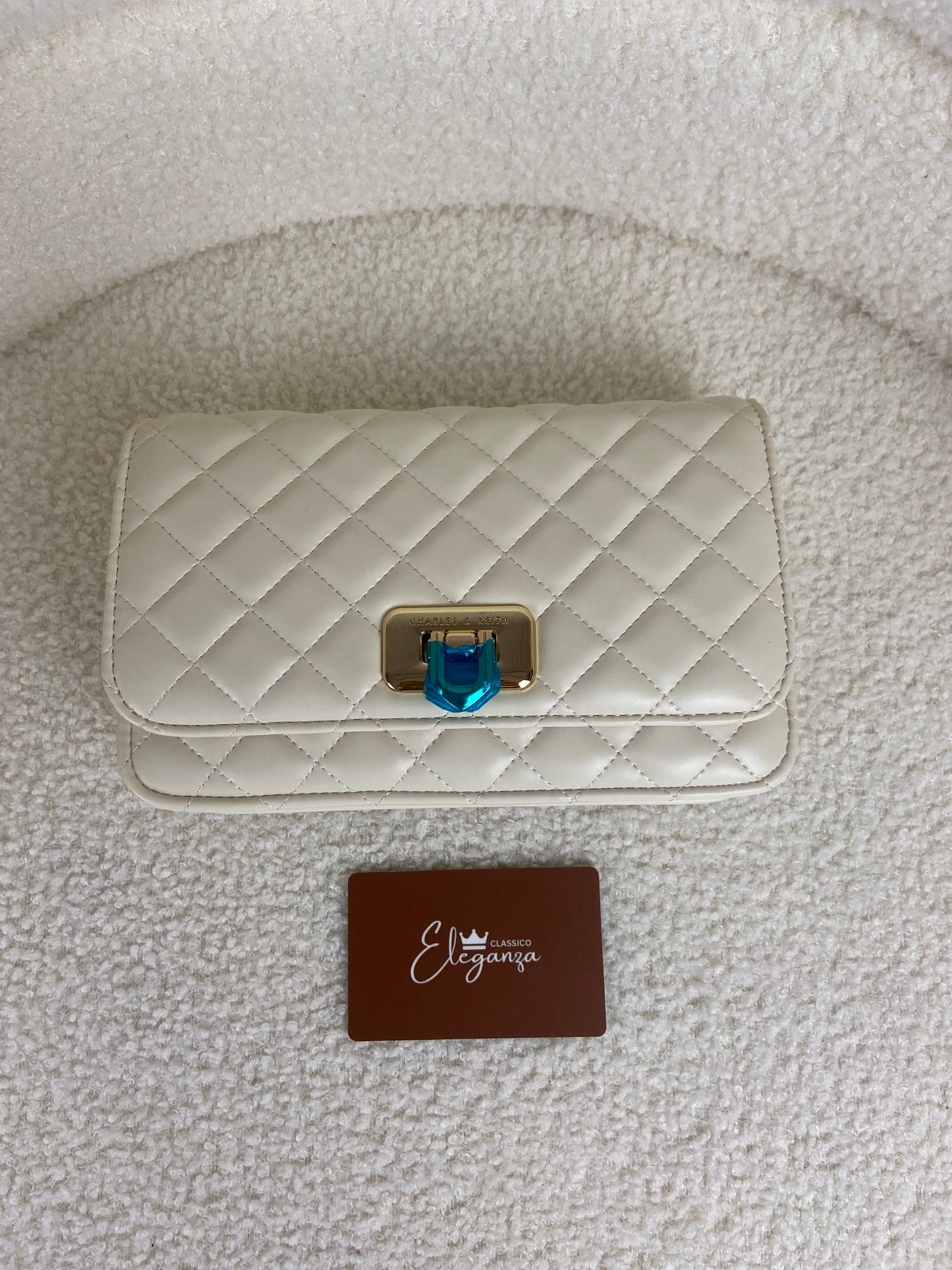 C&K Quilted Flip-Lock Clutch