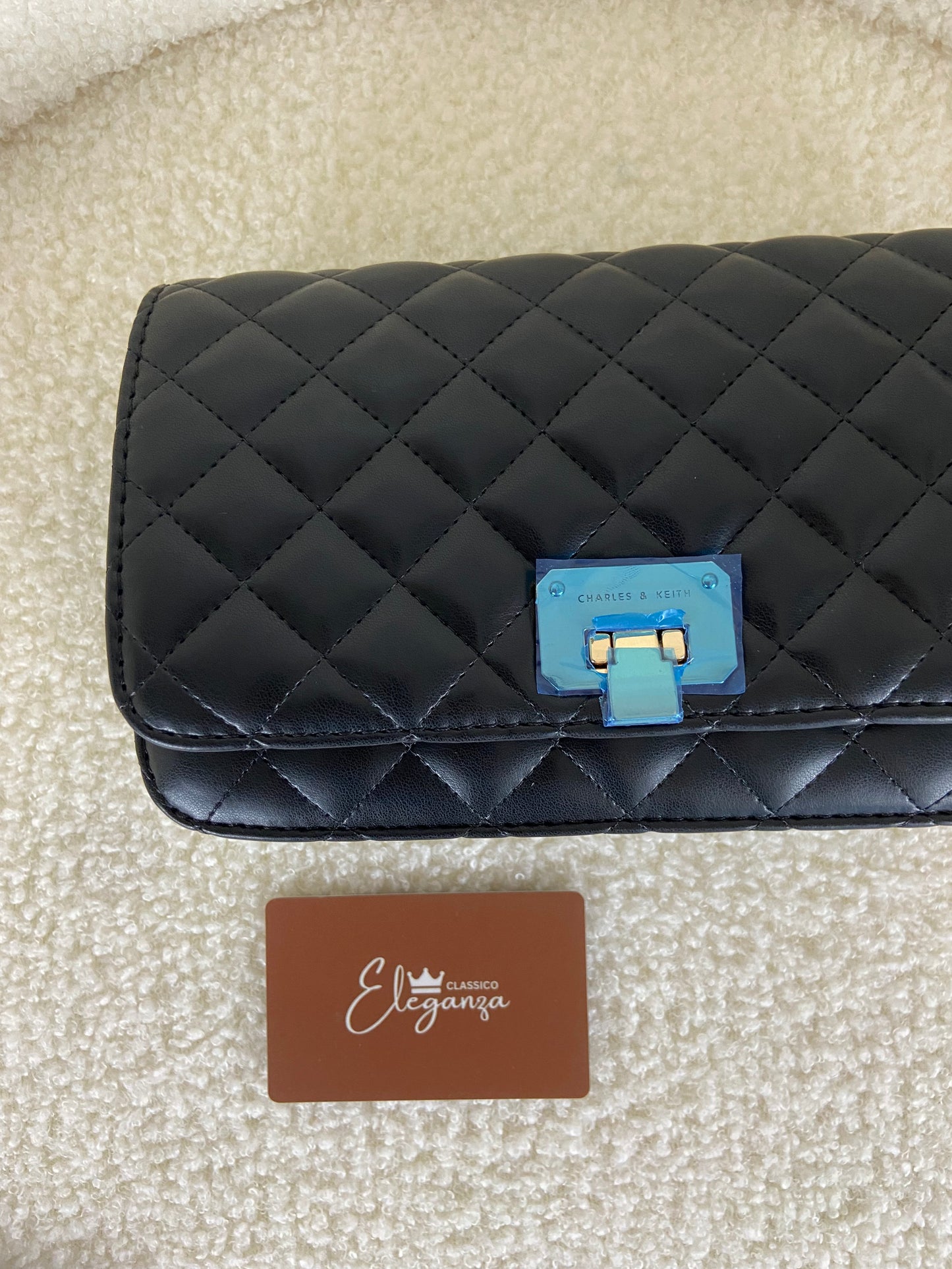 C&K Quilted Flip-Lock Clutch