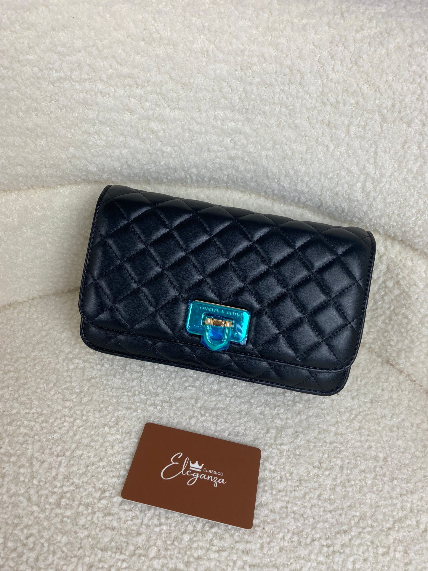 C&K Quilted Flip-Lock Clutch